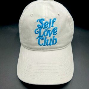 Women’s Mighty Fine “self Love Club” hat. One size‎ fits most adjustable back.